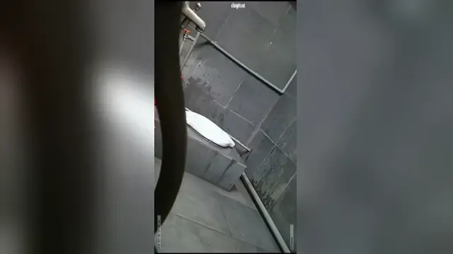 Close-up of secretly filming beautiful girls in public restrooms