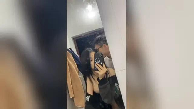 The young student couple having sex in front of the mirror