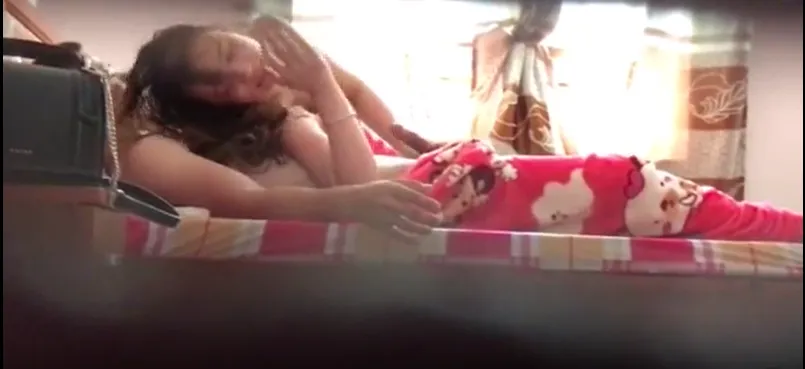 Hidden camera of a couple inside a motel