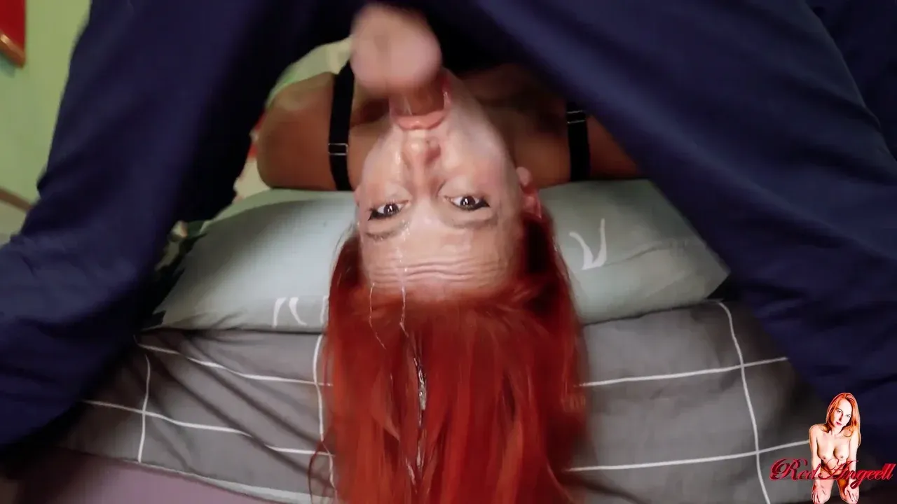 Redhead demonstrates deep-throat technique