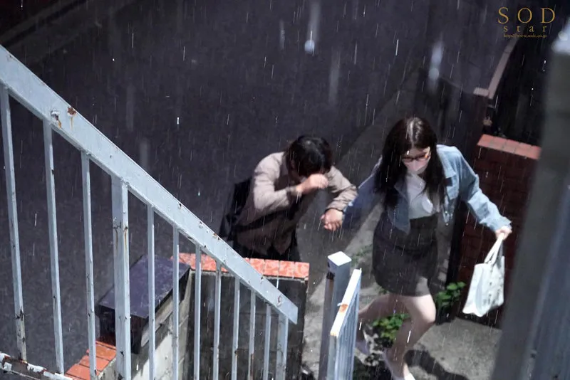 A sudden downpour reveals her massive breasts leading to an all-night carnal marathon with her virgin colleague