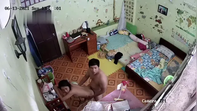 Hacking the husbands cam while he fucks his wife running around the room